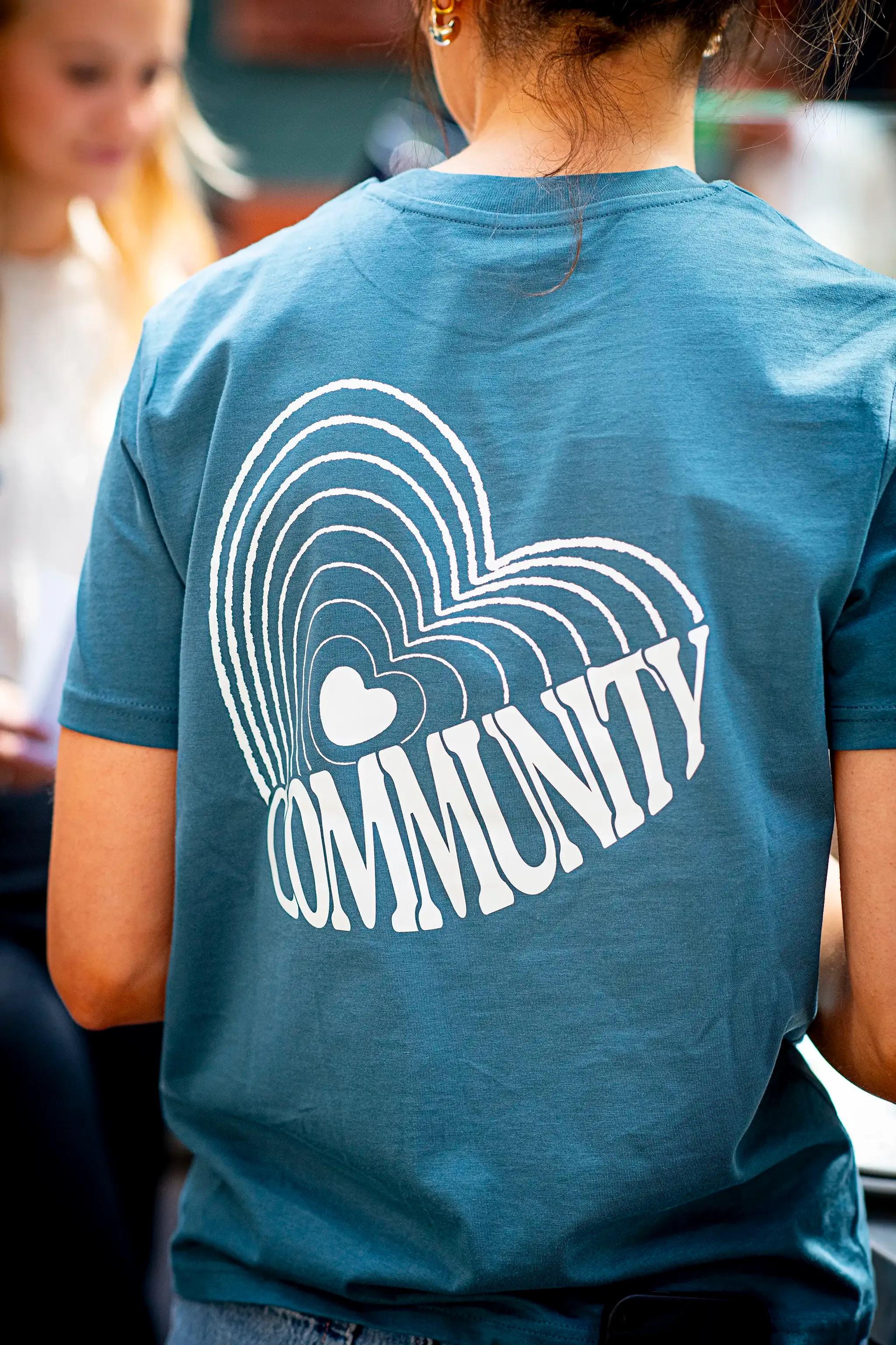 Staff wearing Bundle's branded t-shirts